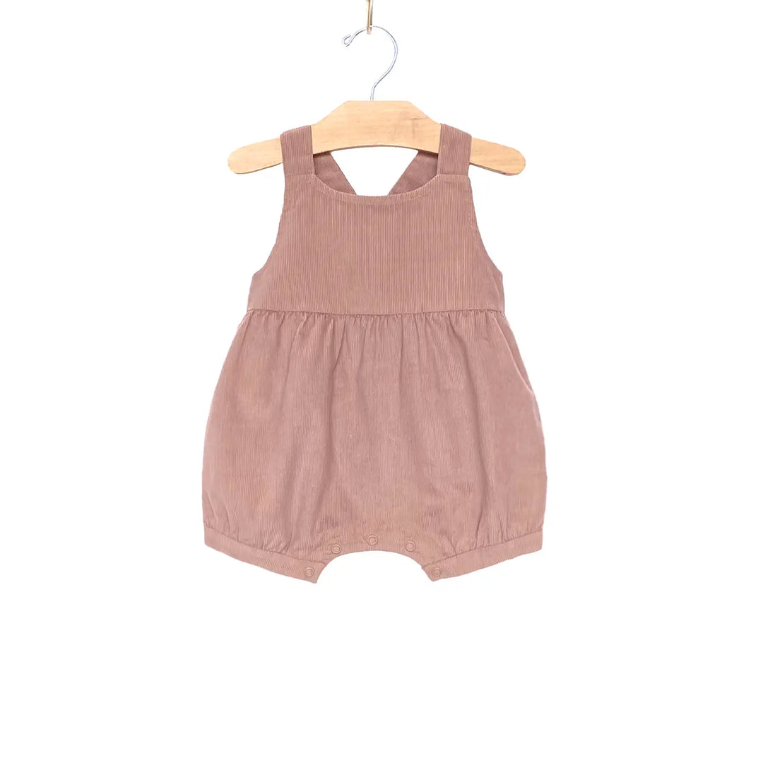 City Mouse Mauve Corduroy Shortie Romper fabric texture close-up showing soft quality material construction