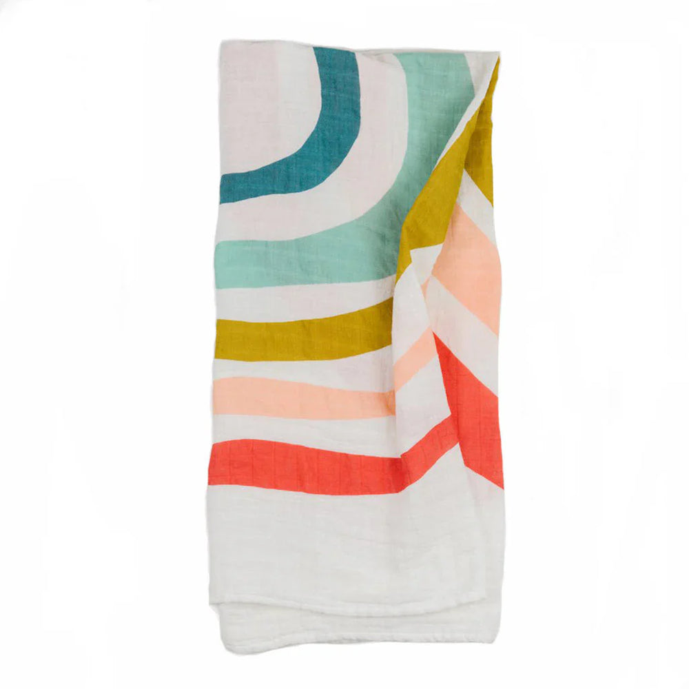 Clementine Kids Rainbow Swaddle created in cozy muslin swaddle blanket fabric.