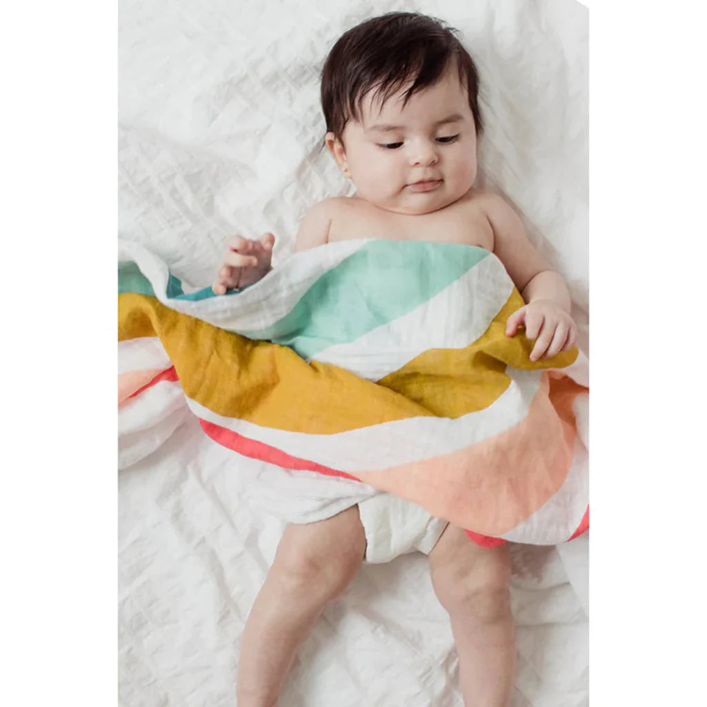 best swaddle from Clementine Kids swaddle blanket in Rainbows