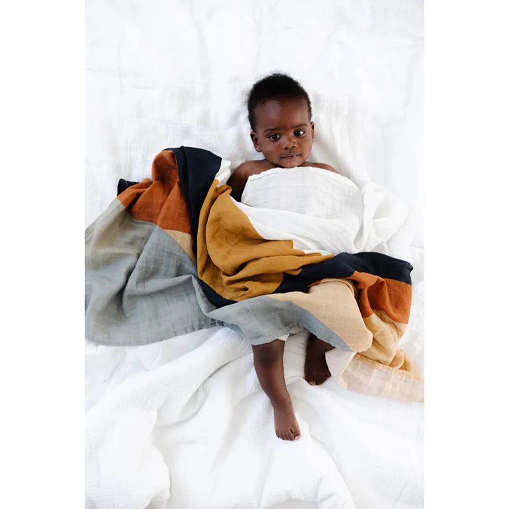 Clementine Kids muslin swaddles in Sunset