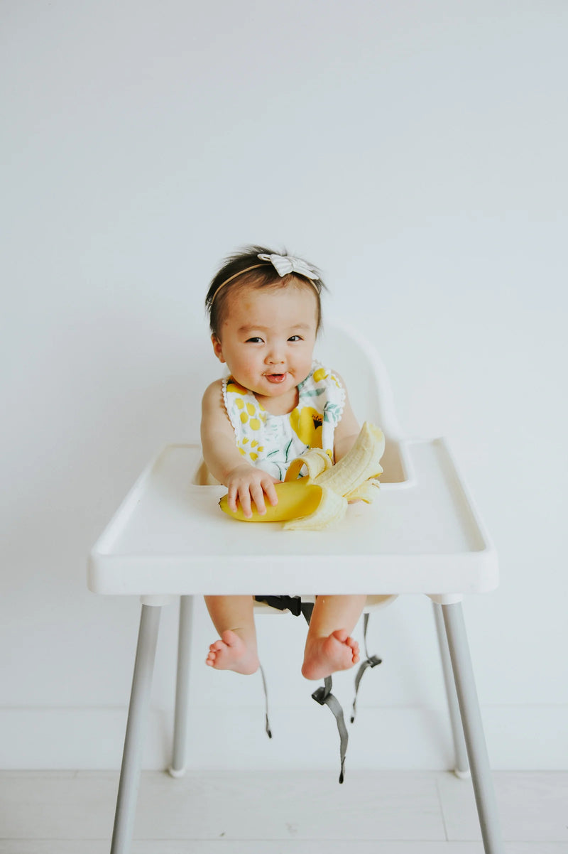 Soft and practical, the Clementine Kids Buttercup Blossom Bib is a sweet pick for infant bibs.