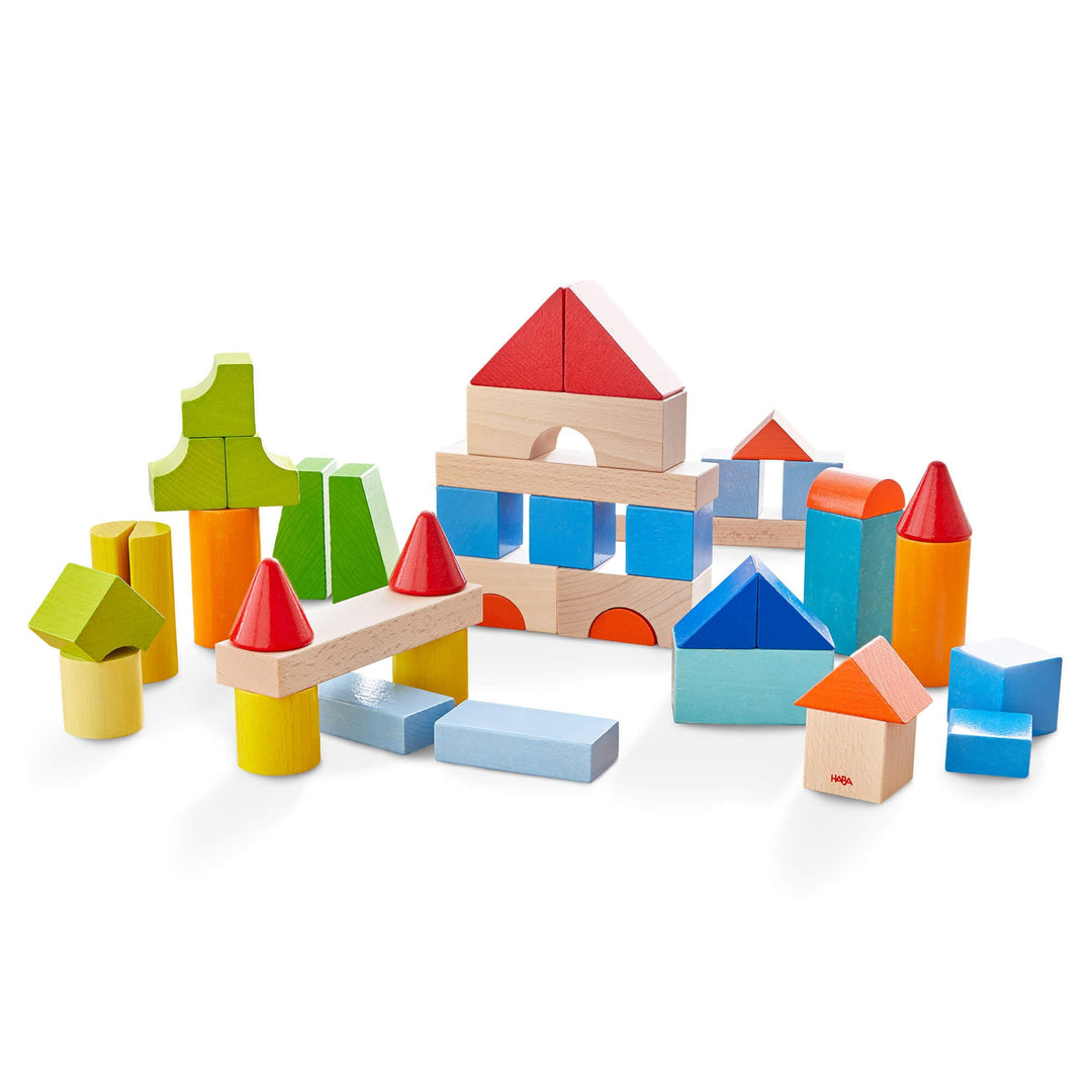 Stack and build with HABA Colored Wooden Building Blocks - 46 Piece Set, a fun wooden toy for toddlers.
