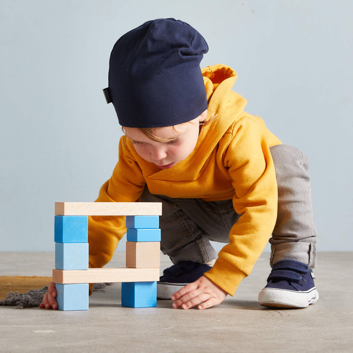 HABA Colored Wooden Building Blocks - 46 Piece Set encourages imaginative play with colorful wood toys.