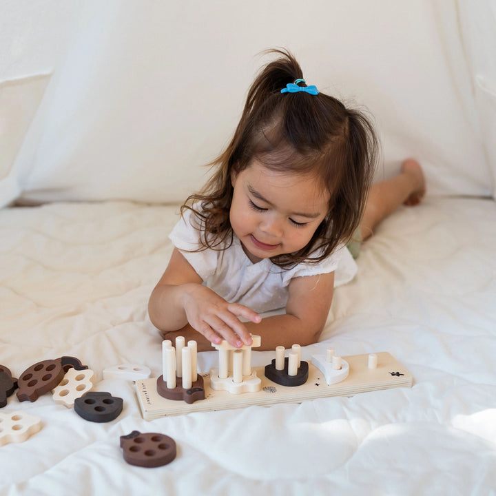 Engaging Wee Gallery Count & Stack Toy, a Montessori toy for number and color recognition.