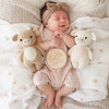 baby with stuffed animal cow