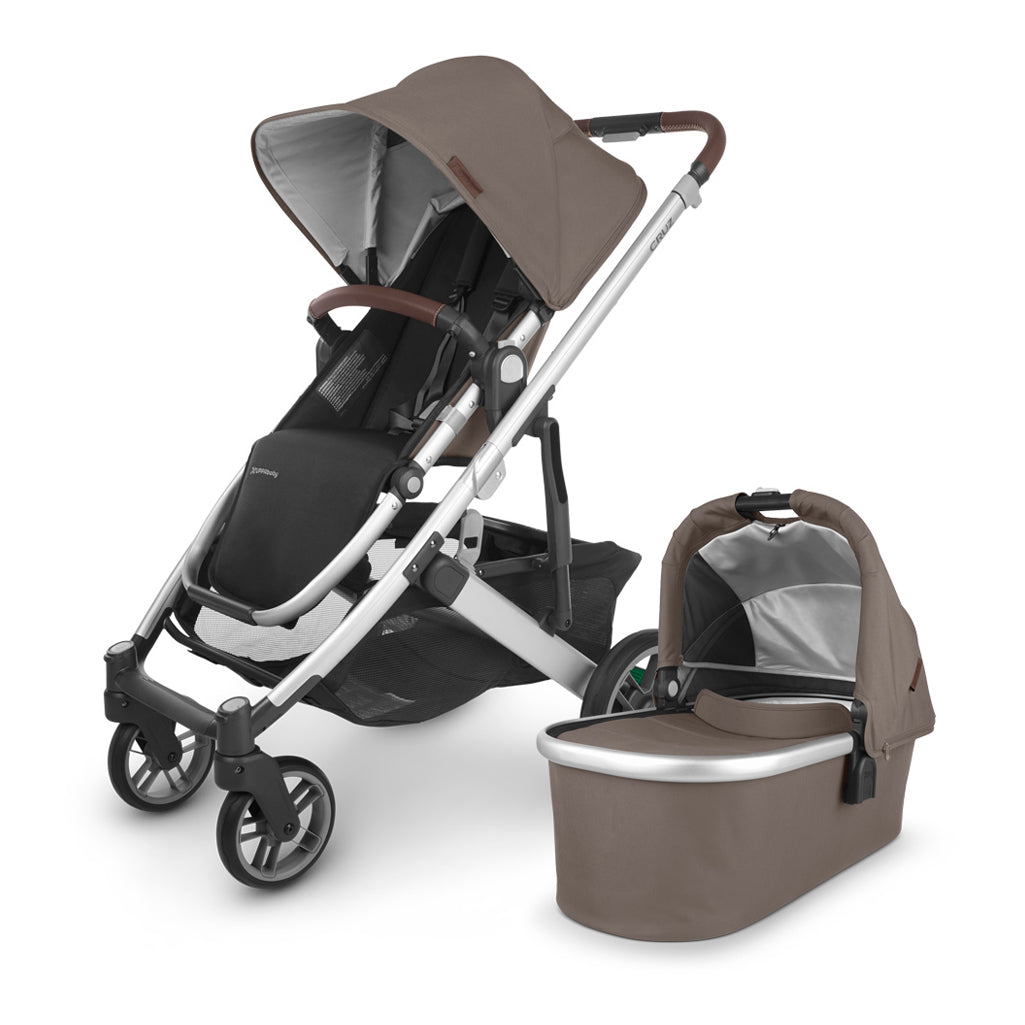 uppbaby cruz stroller with rumble seat and baby bassinet in theo