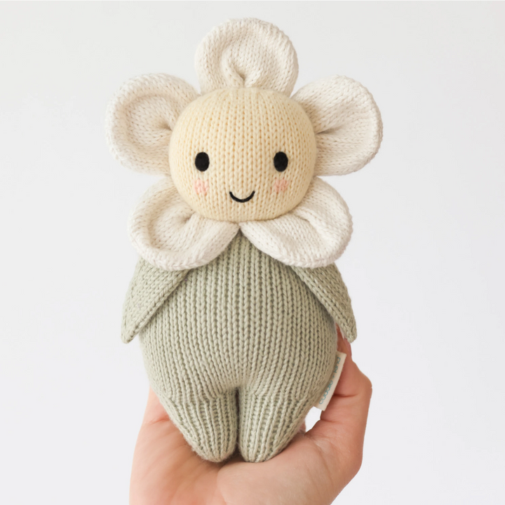 Cuddle + Kind Baby Animals Ivory Daisy stuffed animal with hand-knit charm and softness