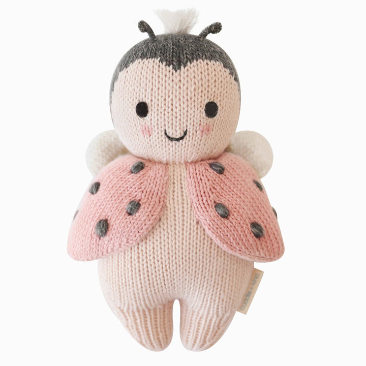 Dressed in red, the Baby Animals ladybug by Cuddle + Kind makes an enchanting plush toys companion.