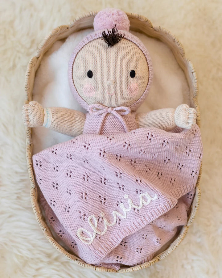 Cuddle + Kind My First Baby in Lavender, a hand-knit cotton baby doll and heirloom first doll gift