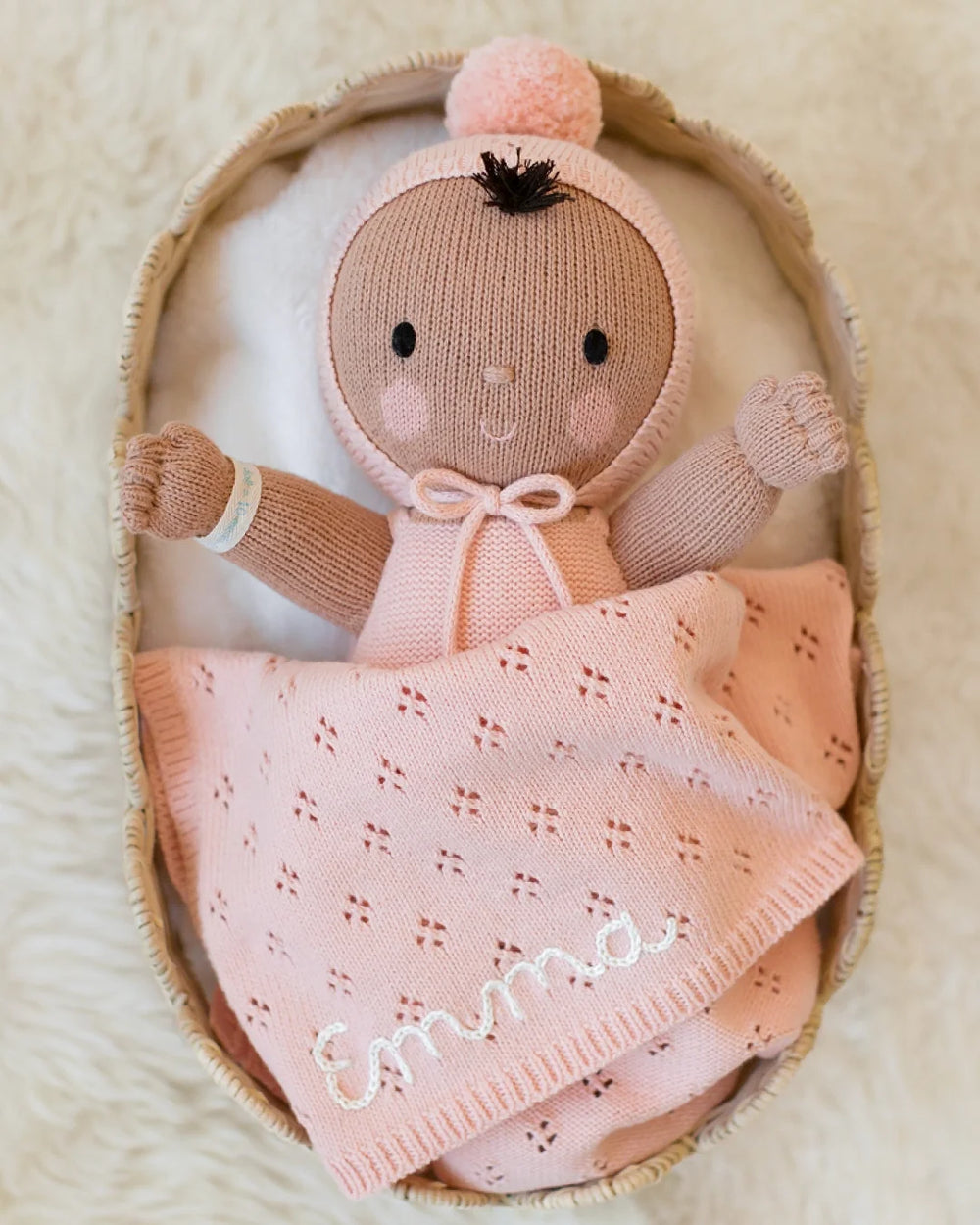 Cuddle + Kind My First Baby in Peach, a hand-knit cotton baby doll and heirloom first doll gift