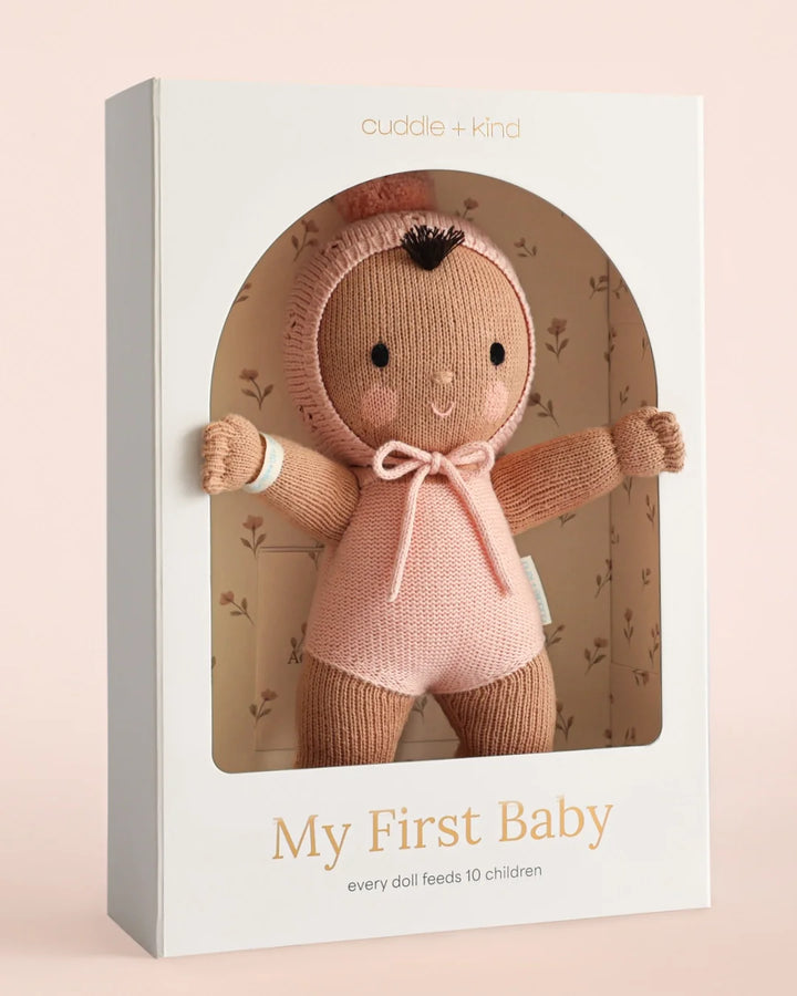 Heirloom knit baby doll Cuddle + Kind My First Baby in Peach, handmade in Peru with natural cotton yarn