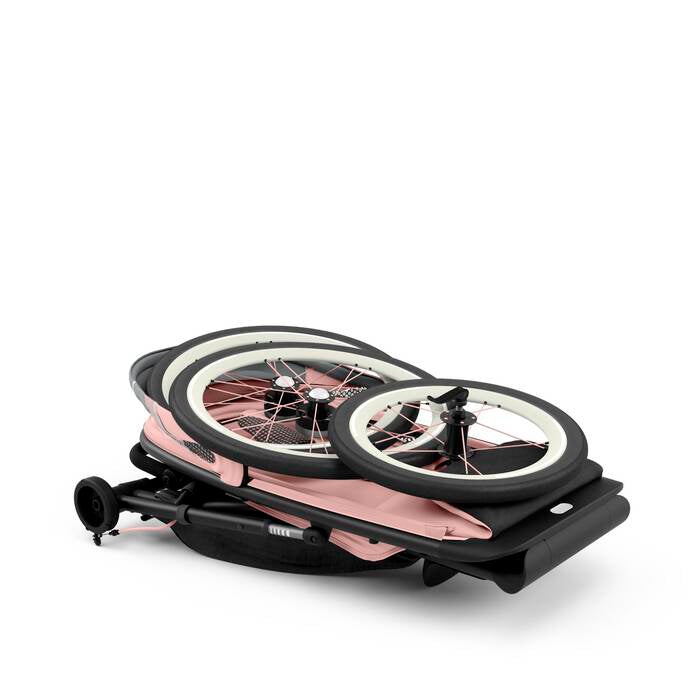 Folded CYBEX Avi best jogging stroller in Silver Pink with Black and Pink details, ideal for stylish urban adventures.