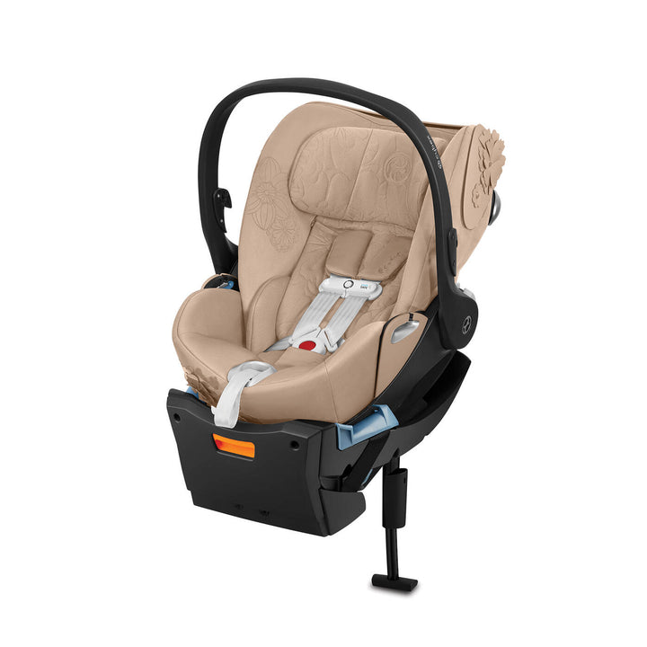 Cybex Cloud Q Infant Car Seat in Spring Blossom Light Beige—best car seats for infants with plush interior lining.