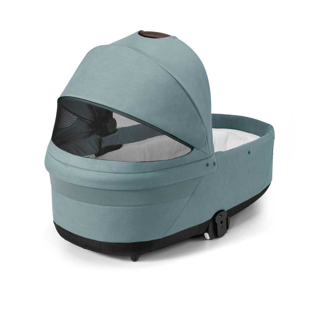 Cybex Cot S Bassinet Stroller in Blue – versatile 3-in-1 stroller with bassinet and car seat combo.