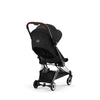 Cybex Coya in White, a sleek stroller for all your travel adventures.