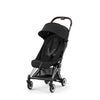 Peach Pink Cybex Coya stroller, ideal for traveling in comfort and style.