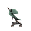 RoseGold + Mirage Grey Cybex Coya, the best rated stroller travel system for parents on the go.