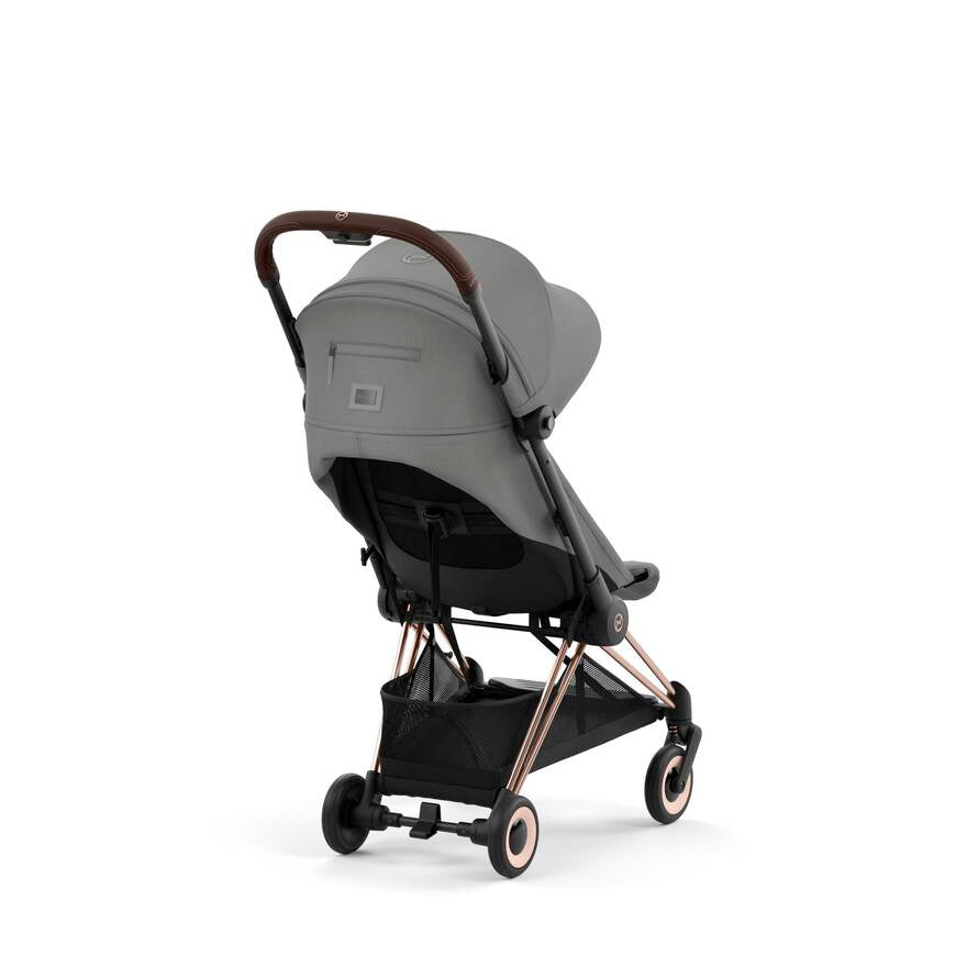 RoseGold + Peach Pink Cybex Coya, the best stroller for plane travel with comfort and style.