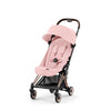 RoseGold + Mirage Grey Cybex Coya, ideal for parents seeking a travel stroller for infant use.