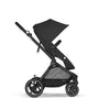 Cybex EOS pram in Moon Black, featuring a convertible design. Pram Cybex for ultimate travel ease.