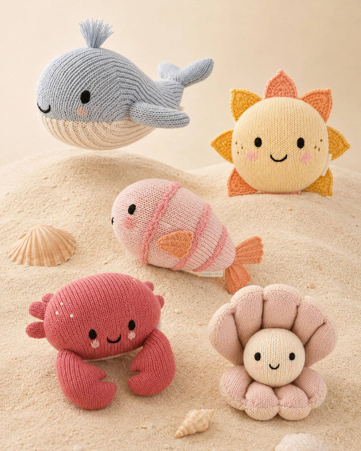 Baby Fish by Cuddle + Kind, a 7-inch knit fish plush toy that gives 5 meals