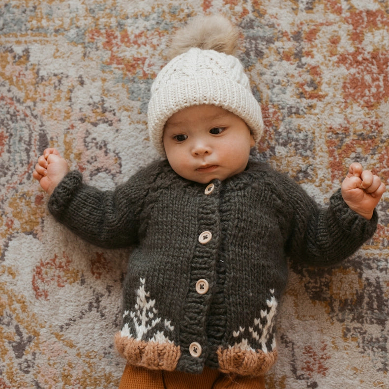 Keep little ones cozy in the Huggalugs Forest Cardigan LodenÑa premium baby cardigan made from soft, warm knit.