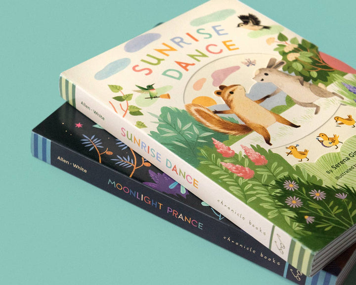 Angled spine view of Sunrise Dance pull-tab board book by Chronicle Books