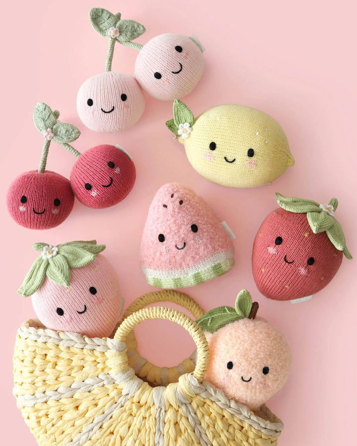 Fruit plush toy for little hands, Cuddle + Kind Baby Peach, handmade in Peru and Nepal