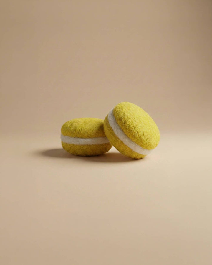Kaddu Felt Macarons arranged for pretend play, handcrafted in Nepal