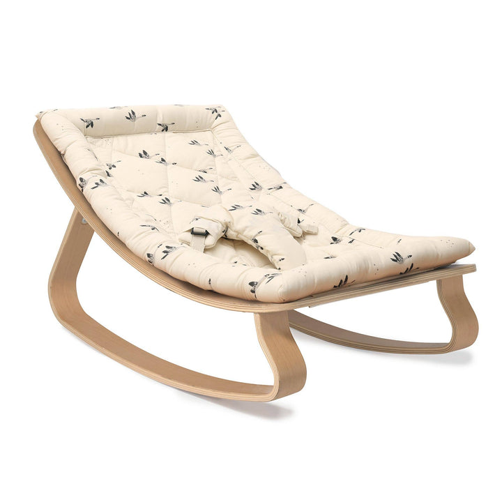 Goose fabric softens the look of the Charlie Crane LEVO Rocker | Beech, perfect for curated baby room furniture