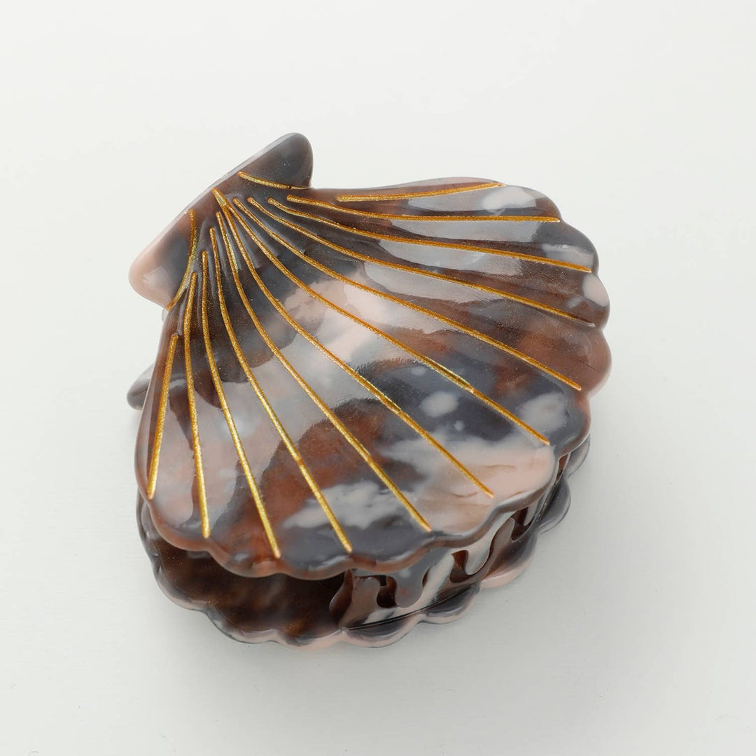 Adorro Calacatta Seashell Claw Clip Small side view showing clip depth seashell silhouette and secure claw teeth for everyday hair styling