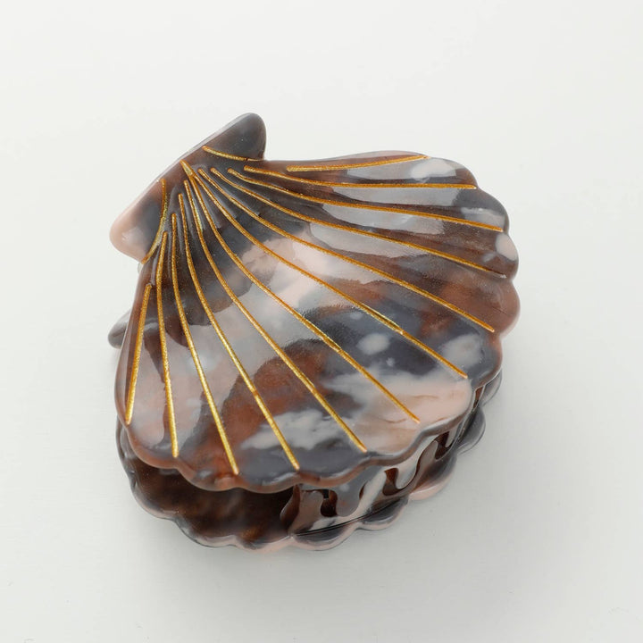 Adorro Calacatta Seashell Claw Clip Small side view showing clip depth seashell silhouette and secure claw teeth for everyday hair styling