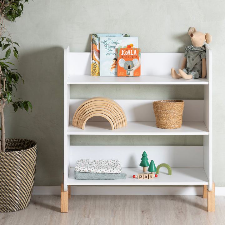 dadada Muse Bookshelf in White + Natural, three-shelf toddler bookshelf with rubberwood legs