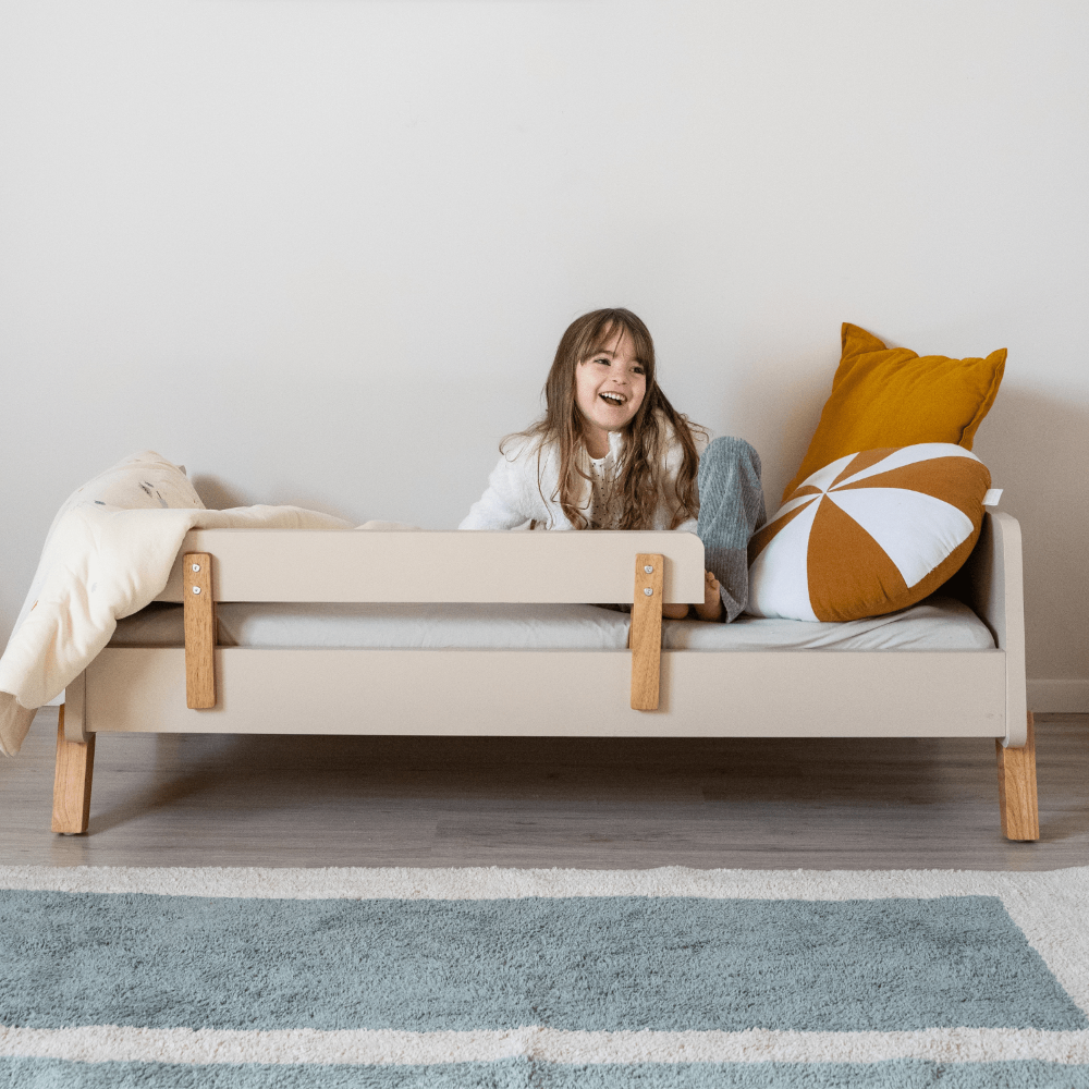 dadada Muse Toddler Bed in Almond Milk + Natural, low wood toddler bed with side rails