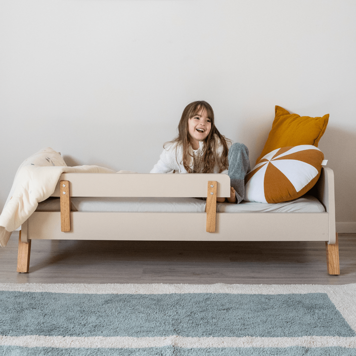 dadada Muse Toddler Bed in Almond Milk + Natural, low wood toddler bed with side rails