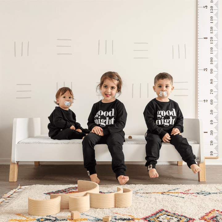 Almond Milk + Natural Muse toddler bed by dadada, soft neutral finish with rubberwood legs