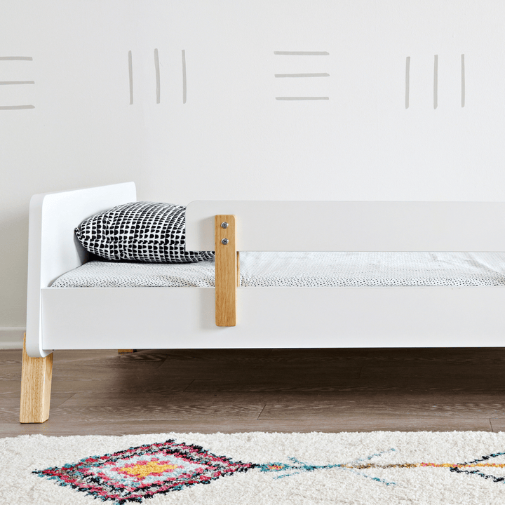 dadada Muse White + Natural toddler bed with two removable safety rails