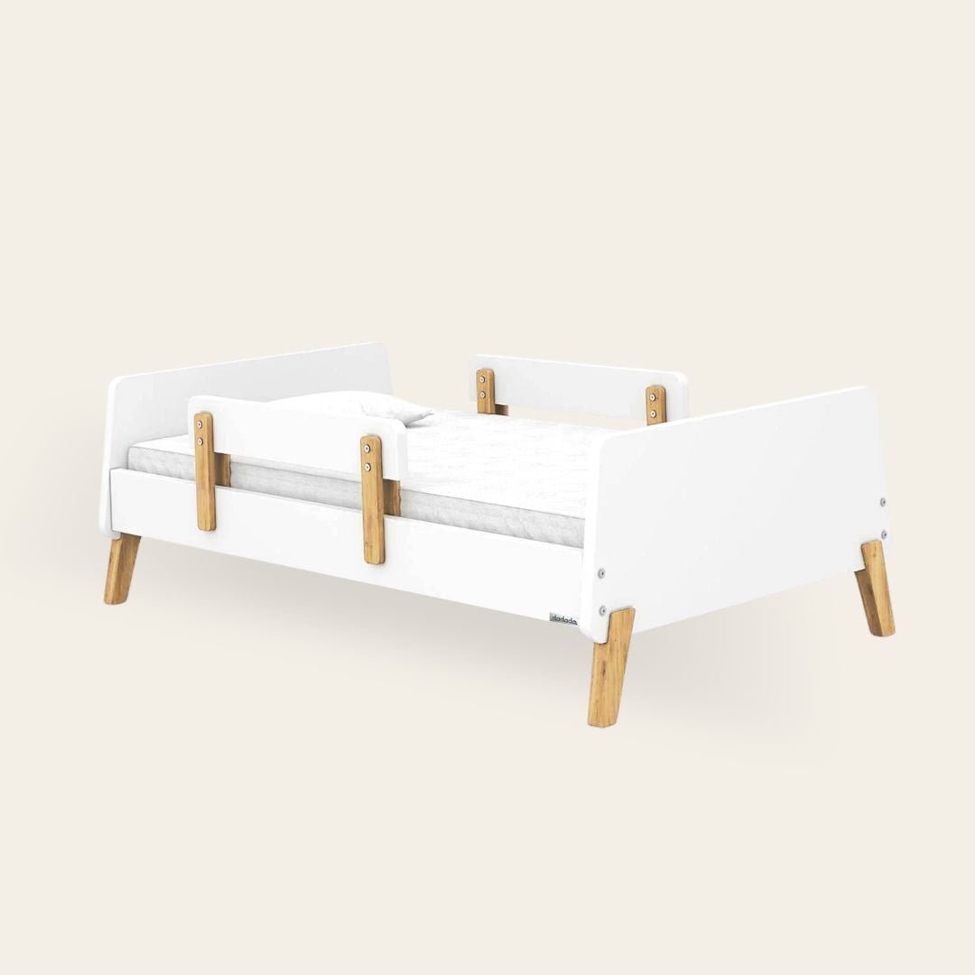 White + Natural dadada Muse toddler bed with artisan-style rubberwood leg joints