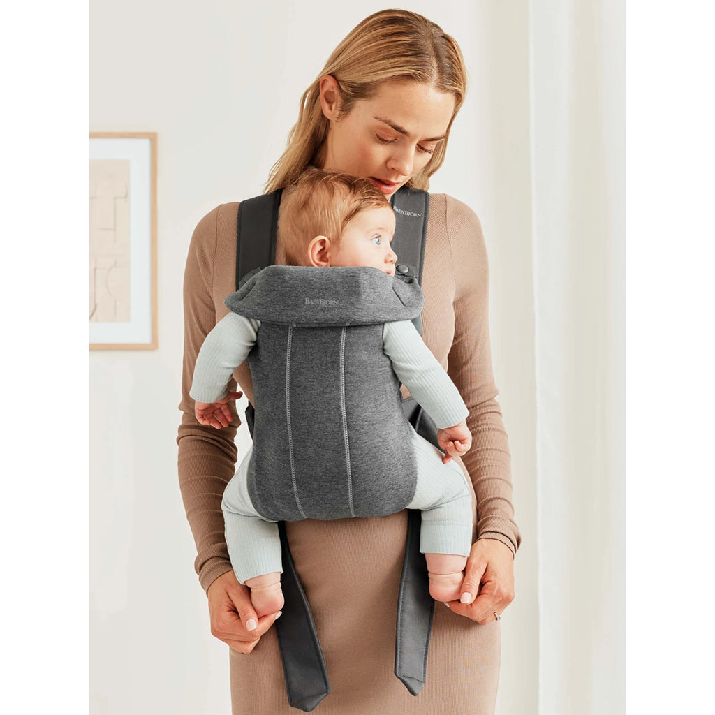 mother babywearing in babybjorn carrier