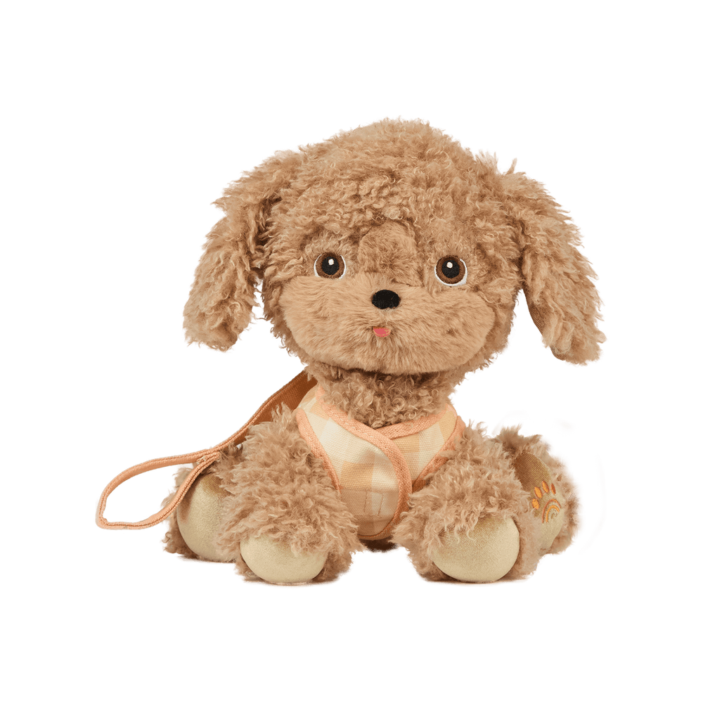 Goldie Dinkum Dog seated in removable harness, posable golden stuffed dog by Dinkum Dolls