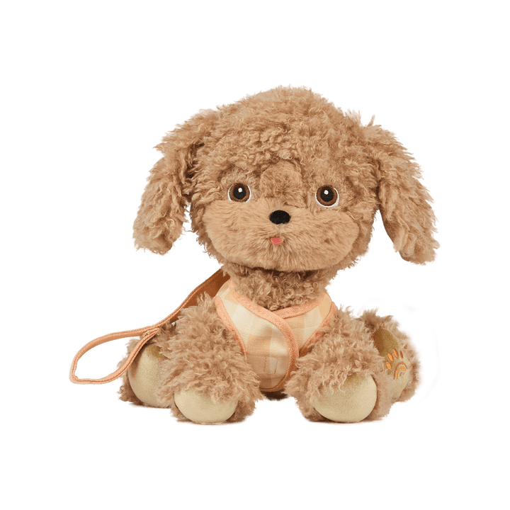 Goldie Dinkum Dog seated in removable harness, posable golden stuffed dog by Dinkum Dolls