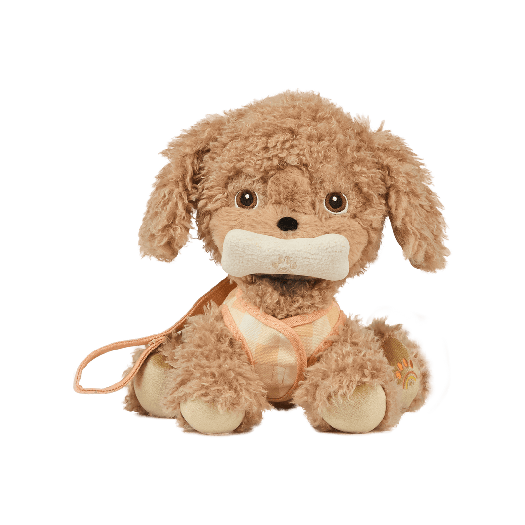 Dinkum Dogs Goldie with magnetic sherpa bone in mouth, Dinkum Dolls plush dog toy