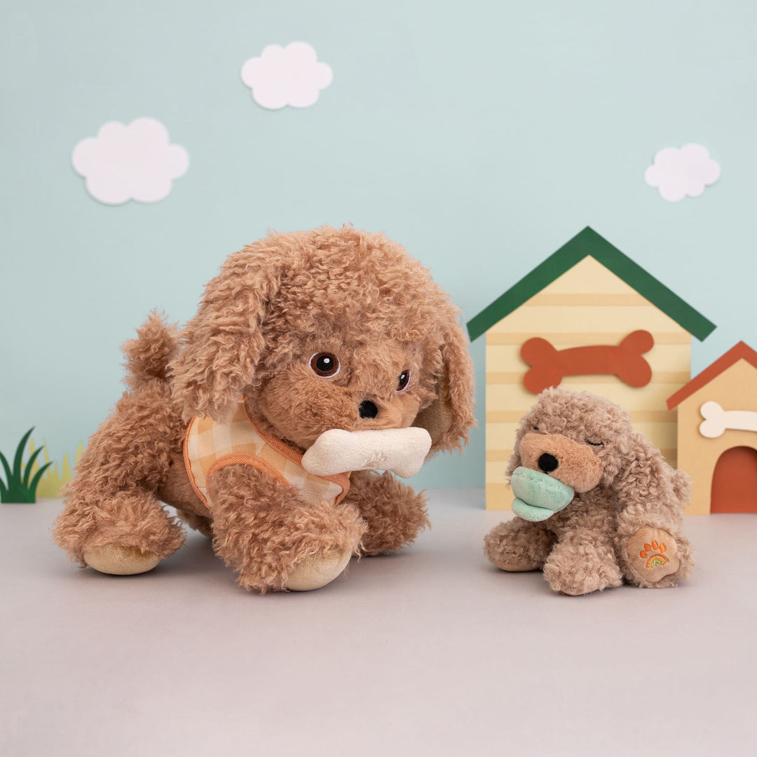 Dinkum Dogs Goldie beside a Binky Puppy and colorful doghouses, Dinkum Dolls play scene