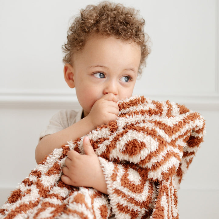 Cozy up naptime with the Saranoni Double-Layer BAMBONI¨ Mini Blanket in Khmer Ñ a must-have best baby blanket for any nursery.