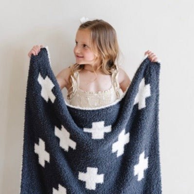 The Charcoal Swiss Cross Saranoni Double-Layer BAMBONI¨ Mini Blanket offers plush softness, making it the best baby blanket for sweet dreams.