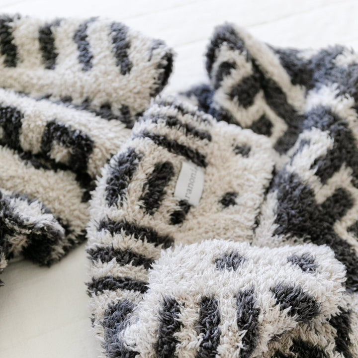Dreamy comfort meets classic style in the Saranoni Double-Layer BAMBONI¨ Mini Blanket in Mudcloth Ñ the perfect soft baby blanket.