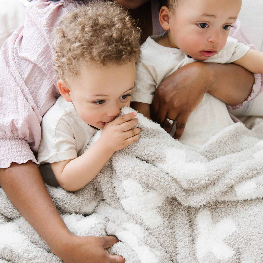 Perfect for cuddles, the Swiss Cross Saranoni Double-Layer BAMBONI¨ Mini Blanket offers soft texture and warmth Ñ a favorite best toddler blanket.