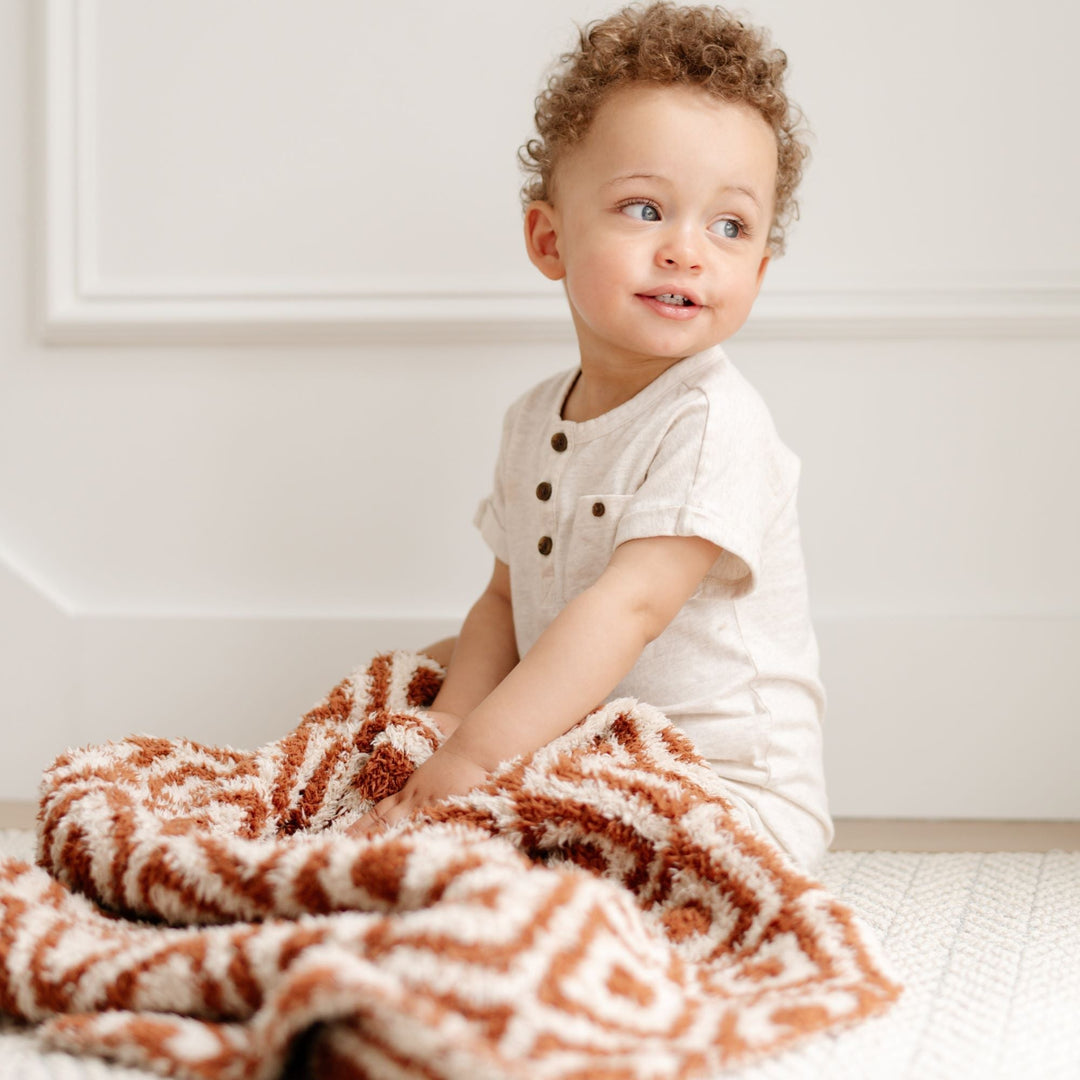 The Saranoni BAMBONI¨ Receiving Blanket in Khmer feels like a hugÑsoft, stretchy, and perfect for baby boy blanket collections.