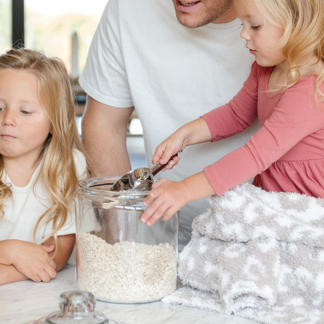 The Saranoni BAMBONI¨ Receiving Blanket in Gray Leopard color offers plush comfort, ideal for baby boy or girl blankets.
