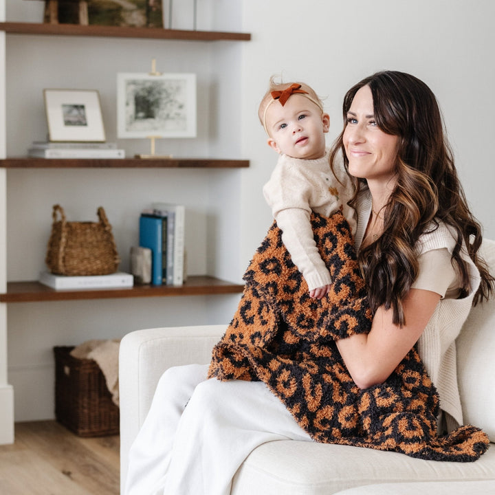 Soft and soothing, the Saranoni BAMBONI¨ Receiving Blanket in Classic Leopard makes a beautiful baby girl blanket.